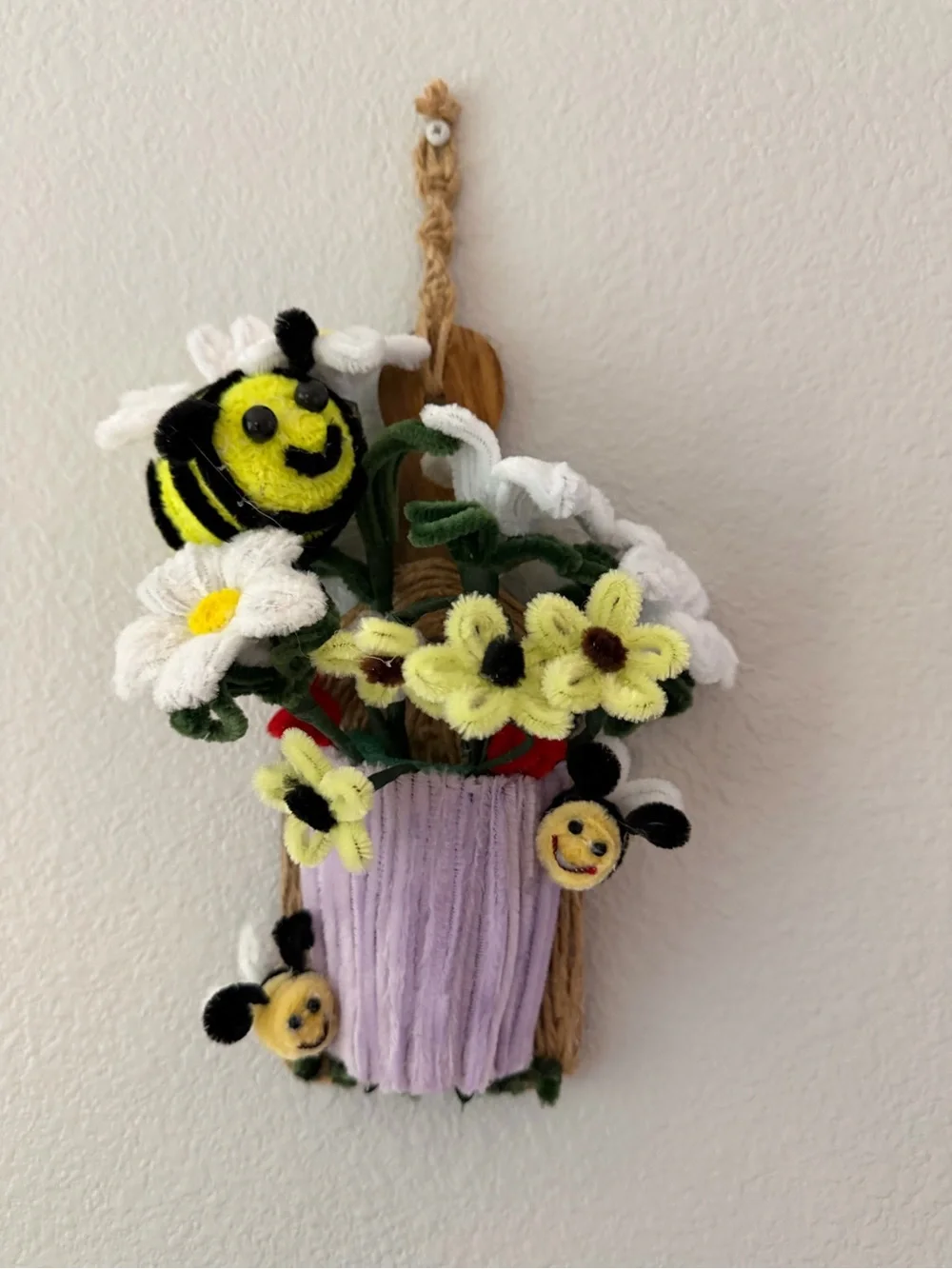 Whimsical Purple Flower Pot Wall Art with Yellow Bee Accents